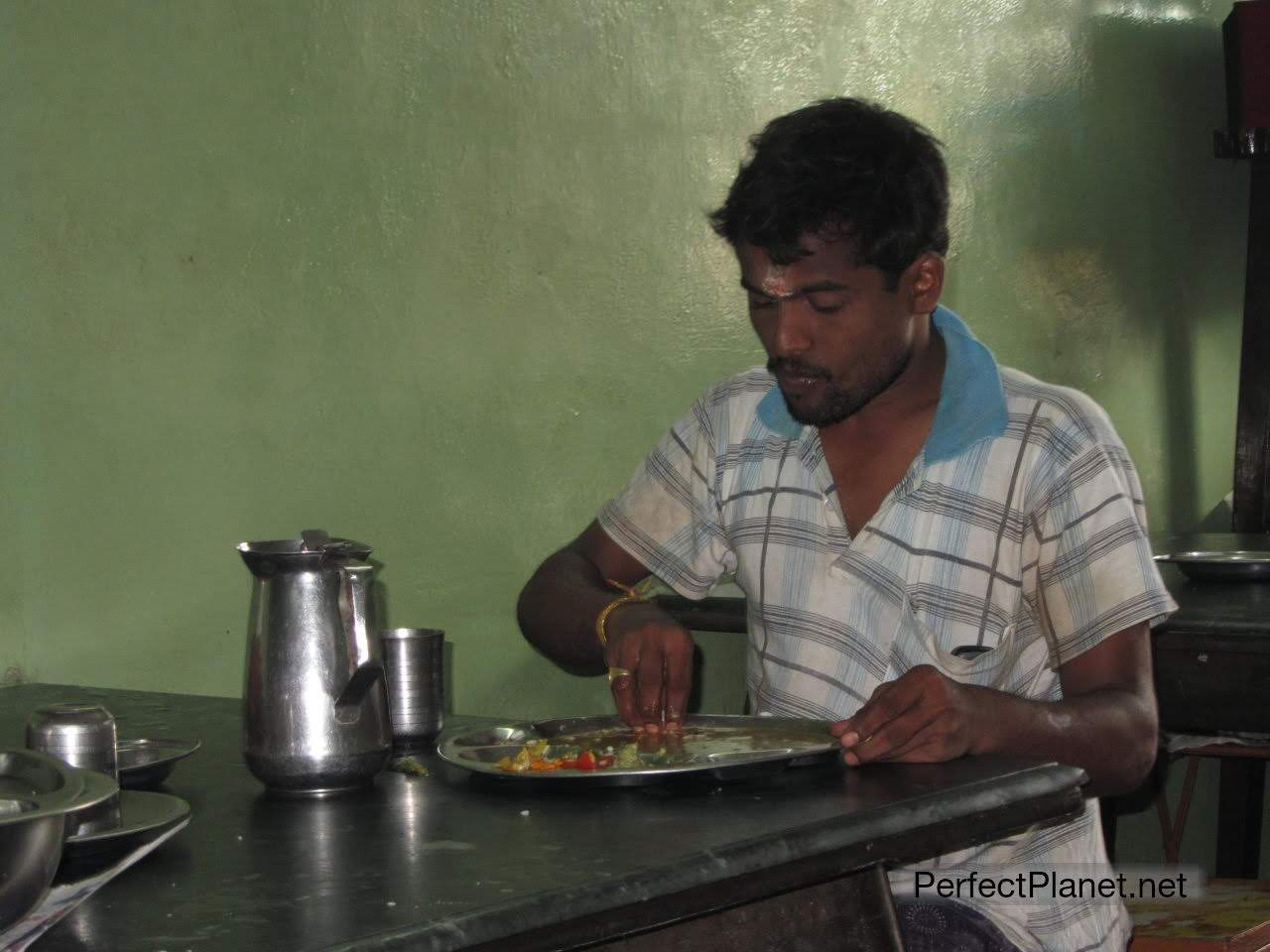 Man eating at the restaurant